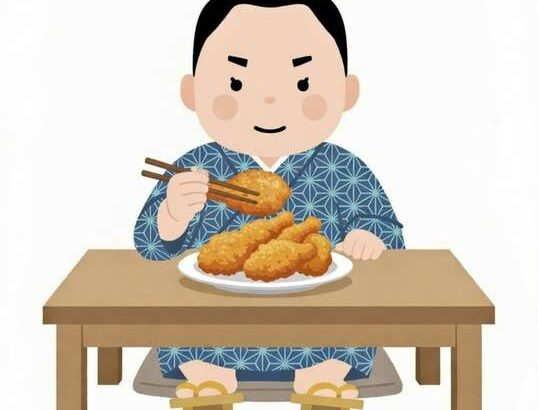 唐揚げを食べる力士